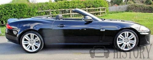 Jaguar XK soft top side view